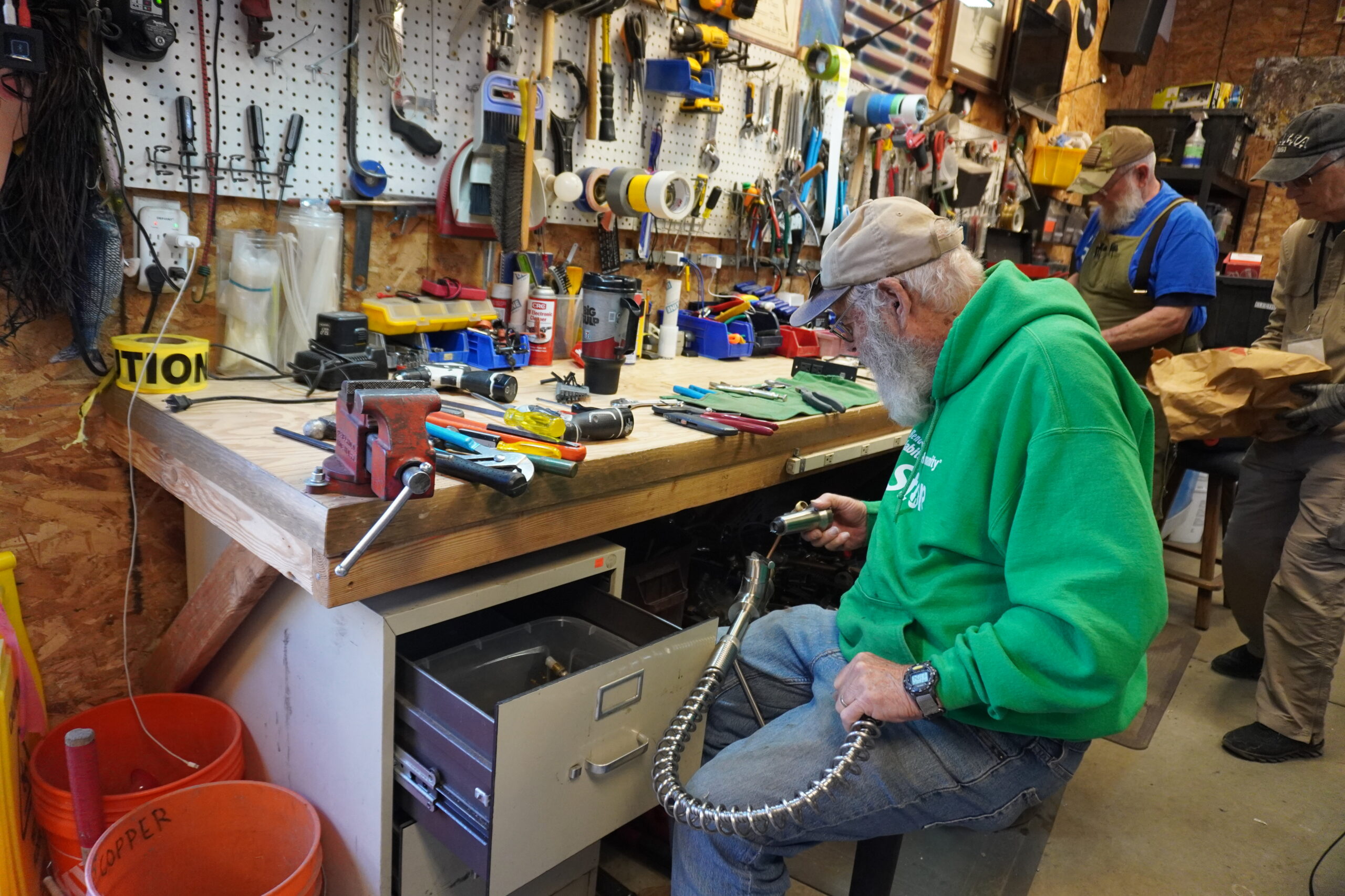 ReStore volunteers testing and repairing appliances at Bend-Redmond Habitat for Humanity